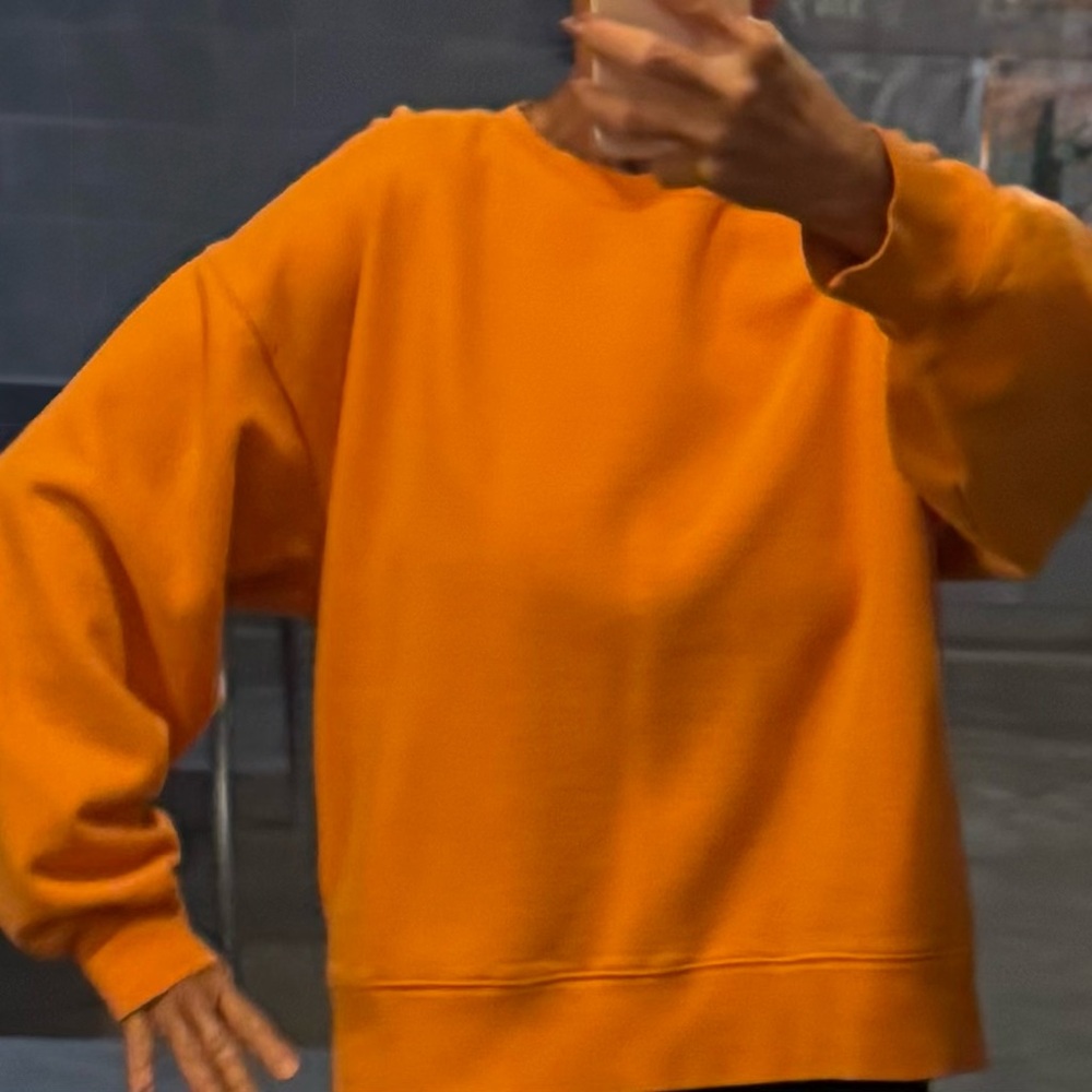 Aritzia orange sweatshirt